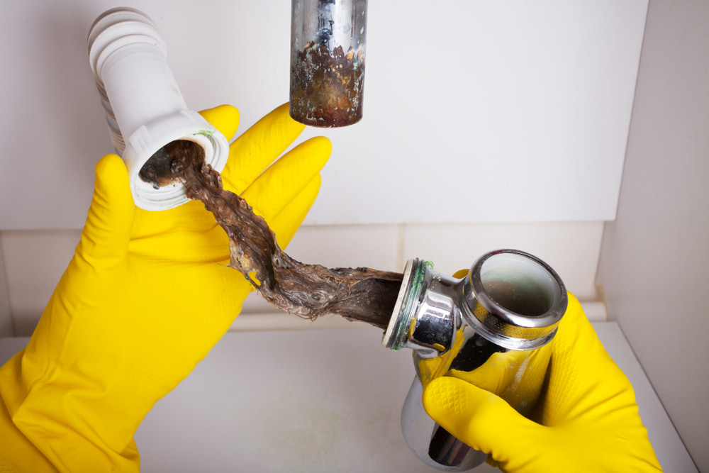 What is the most common cause of blocked drains