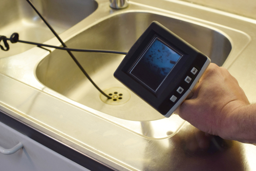 Who offers detailed sewer line camera inspection near me