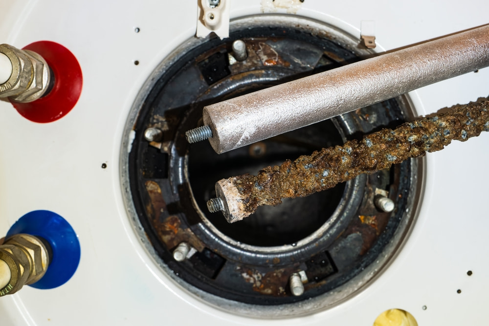 What causes hot water to smell like rotten eggs